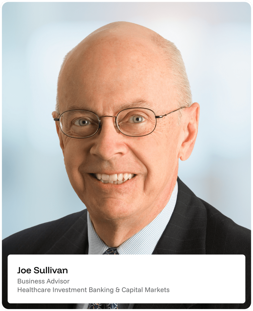 Smiling older man with glasses, a suit, and a striped tie, posed in front of a blurred office background. A name tag at the bottom reads Joe Sullivan, Business Advisor, Healthcare Investment Banking & Capital Markets..