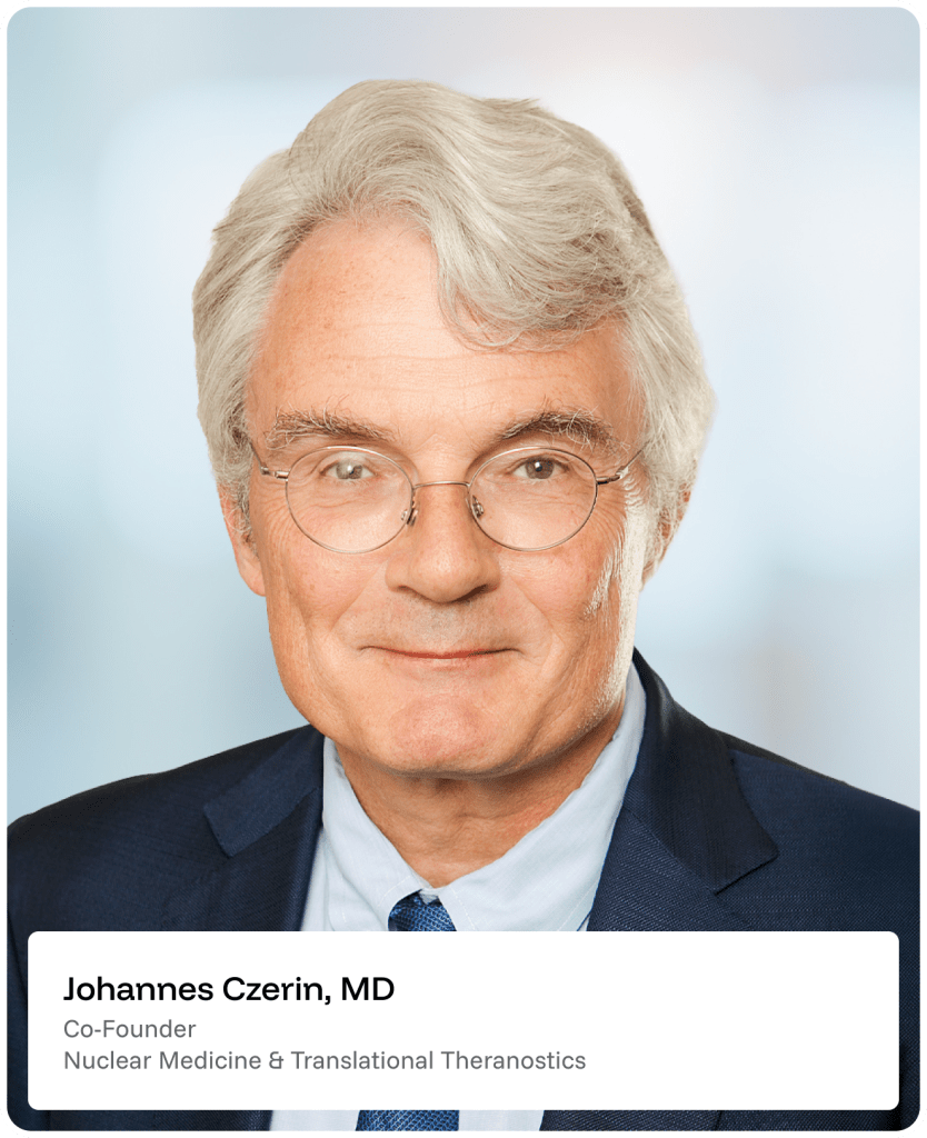 Portrait of an older man with gray hair and glasses, wearing a suit and tie, smiling slightly. Text below identifies him as Johannes Czerin, MD, Co-Founder, Nuclear Medicine & Translational Theranostics..